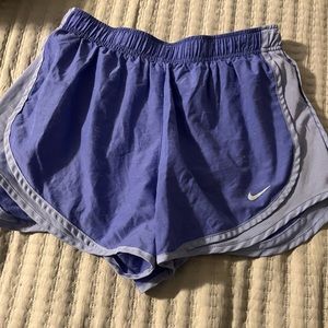 Purple Nike shorts, size large